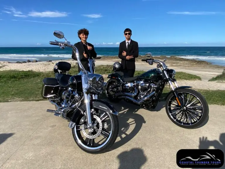 Group formal guests with Harley-Davidson motorcycles at Flat Rock, Currumbin on the Gold Coast